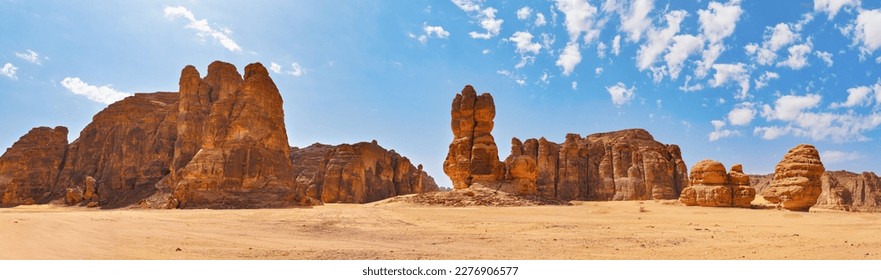 Rocky desert formations with sand in foreground, typical landscape of Al Ula, Saudi Arabia. High resolution panorama - Powered by Shutterstock