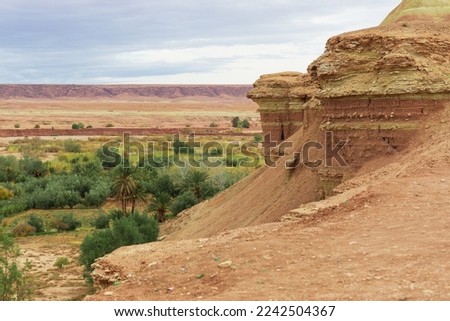 Rocky desert landscape with green belts in Morocco