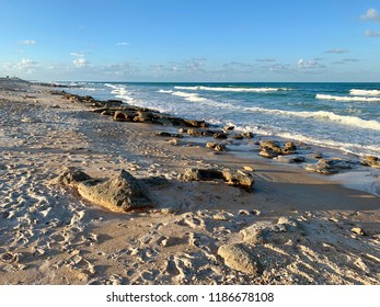 Rocky Florida Beach With Waves.