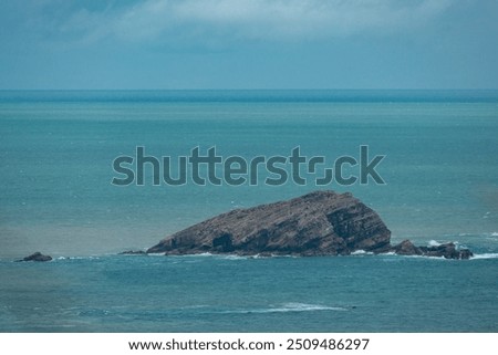 Similar – Image, Stock Photo Rocky formation island in rippling seawater