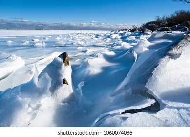 The Rocky Harbor Of Plymouth, Massachusetts Covered In Ice In The Winter.