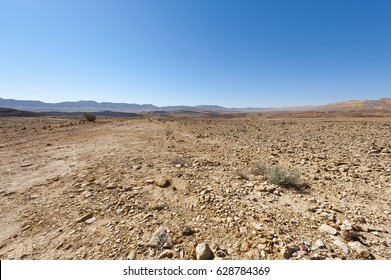Rocky hills of the Negev Desert in Israel. Breathtaking landscape of the desert rock formations in the Southern Israel Desert. - Shutterstock ID 628784369