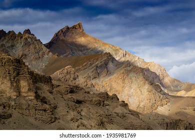 Rocky Himalayan Mountian Landscape Of Kargil With Blue Cloudy Sky In Background , Green Valley , Ladakh, Jammu And Kashmir, India