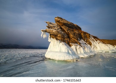 Rocky island covered with ice at frozen Baikal lake - Shutterstock ID 1746101663