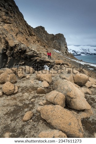 Rocky Island; Deception Island, South Shetlands; Rock and blue water; Deception Island, South Bay, Blue Shetlands