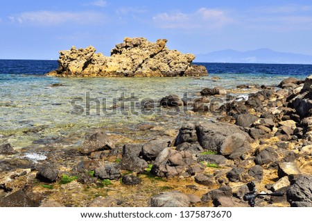 Similar – Foto Bild Küste mit Felsen und Meer im Sonnenuntergang