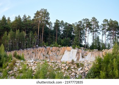 Rocky Landscape In A Sandy Stone Quarry, Trees On The Rocks