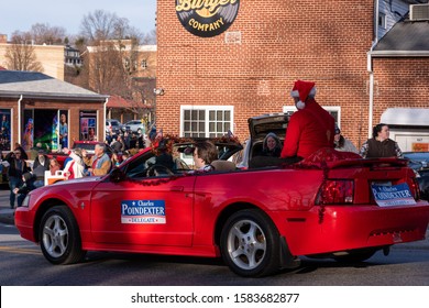 Rocky Mount, Virginia, USA. December 8th 2019. Delegate Charles Poindexter (Republican) Sitting On The Back Of A Red Ford Mustang During The Annual Rocky Mount Christmas Parade.