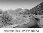 Rocky Mountain National Park in Colorado, USA. Horseshoe Park Valley with Fall River and Mummy Range. Black and white retro filter photo.