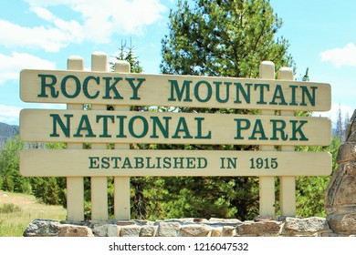 Rocky Mountain National Park, Colorado Park Entrance Sign With Trees In The Background