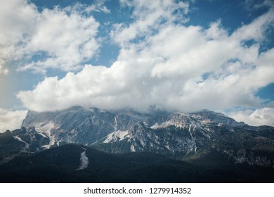Rocky Mountain Range in Clouds