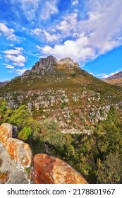 Rocky Mountain With Trees And Grass On A Beautiful Sunny Summer Day. Serene, Calm Slope With No People In Peaceful Natural Environment. Summit Is Located In The Western Cape Of South Africa