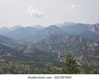 Rocky Mountain View With Trees And Estes Park Town Below