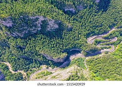 Rocky Mountain And Winding Road, Above View Bicaz Gorges In Romanian Carpathians.