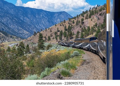 Rocky Mountaineer train riding through the Fraser Valley, British Columbia, Canada.