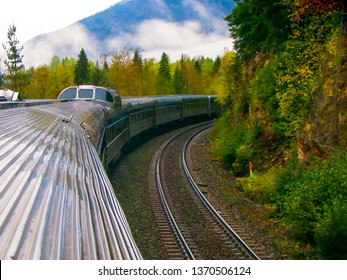 Rocky Mountaineer Train Traveling Through The Rocky Mountains In Canada