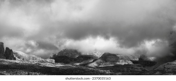 Rocky mountainside panorama in Cadini di Misurina in black and white, Dolomites, Italy