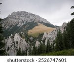 Rocky outcroppings in Bridger Mountain range by Bozeman Montana in summer and burn area