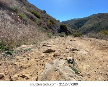 Rocky Part Of The Trail Leading Through Point Mugu State Park And The Santa Monica Mountains, California. Clear Blue Skies Overhead