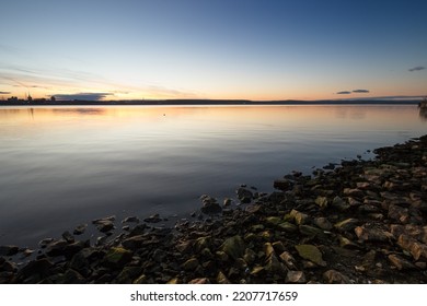 Rocky River Bank At Sunset.