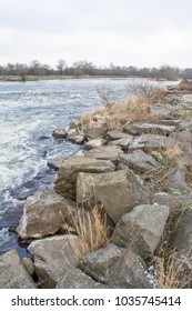 Rocky River Bank Winter Scene
