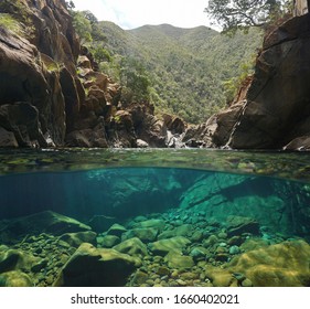 Rocky River With Clear Water, Split View Over And Under Water Surface, Oceania, New Caledonia, Dumbea