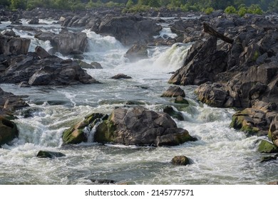  A Rocky River waterfall flowing on a summer day
