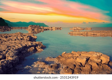 Rocky seascape at sunset. Delta river - Powered by Shutterstock