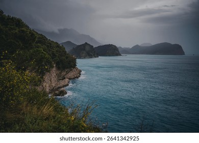 Rocky seashore, beautiful mountain sea nature landscape, cloudy weather