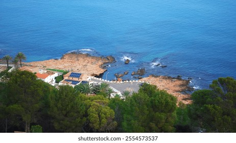 Rocky seashore, sea view from a height, Mediterranean Sea, Denia, Spain - Powered by Shutterstock