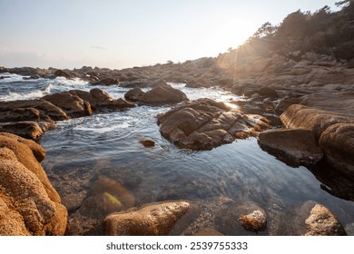 Rocky shore between escalet beach and Cap Taillat, in Ramatuelle, near Saint-Tropez, mediterranean sea, French Riviera, Provence, Europe, France.  - Powered by Shutterstock