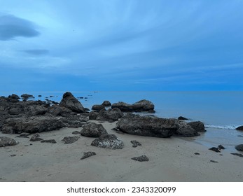 Rocky shore with fairly calm sea