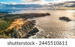 Rocky Shore on East Coast of Atlantic Ocean. Aerial Nature Background. Sunny Blue Sky. Newfoundland, Canada.