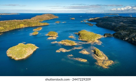 Rocky Shore on East Coast of Atlantic Ocean. Aerial Nature Background. Sunny Blue Sky. Newfoundland, Canada. - Powered by Shutterstock