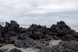 A Rocky Shore Of South Iceland Beach With Black Volcanic Rocks In The Iceland South Coast