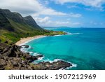 Rocky shoreline and pocket beach at Makapuʻu Point, western end of Oahu, Hawaii