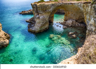 Rocky stacks of Santo Andrea on the coast of Salento in Puglia in Italy