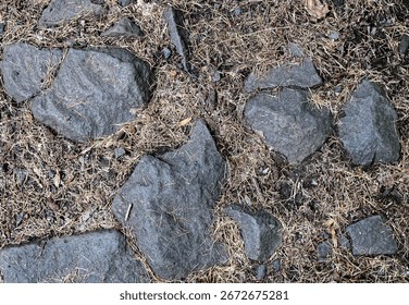 Rocky surface of a pathway close up