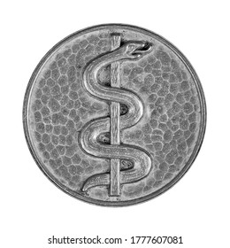 Rod of asclepius embossing on ancient round silver plate