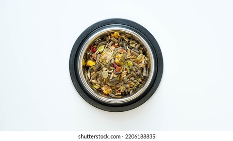 Rodent Food From Cereals And Seeds In A Metal Round Bowl On A White Background