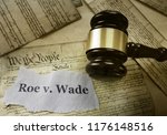  Roe v Wade news headline with gavel on a copy of the United States Constitution                              