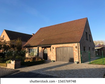 Roeselare, Belgium - 12 November 2019: typical Belgian detached brick villa house real estate property