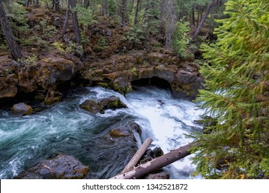 The Rogue River flows underground and exits at a beautiful natural bridge - Shutterstock ID 1342521872