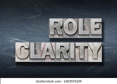 Role Clarity Phrase Made From Metallic Letterpress On Dark Jeans Background