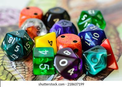 role playing dices lying on picture background - stock photo