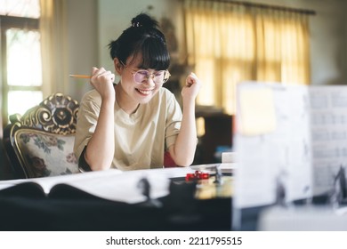 Role Playing Tabletop And Board Game Hobby Concept. Happy Young Adult Asian Woman Enjoying With Storytelling Fantasy Adventure. Blur Foreground With Monster Miniatures And Dice Component.