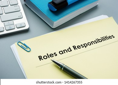 Roles And Responsibilities documents in the office. - Shutterstock ID 1414267355
