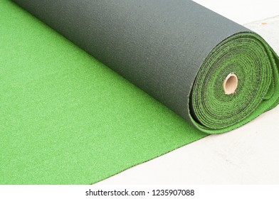 Roll Of Artificial Turf On Ground