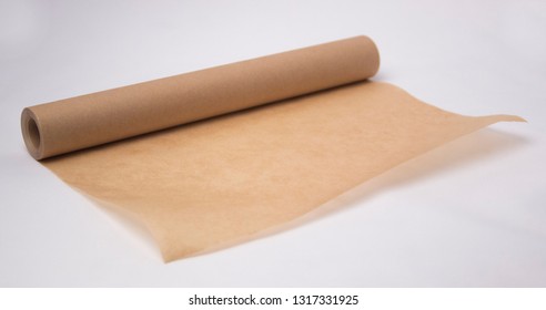 Roll Of Baking Parchment Paper Isolated On White - Image