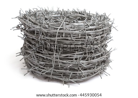 Roll of barb wire on isolated white background with cast shadow